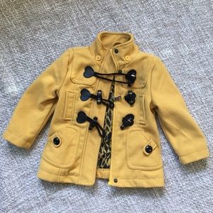 Cute yellow coat lined in Leopard print.